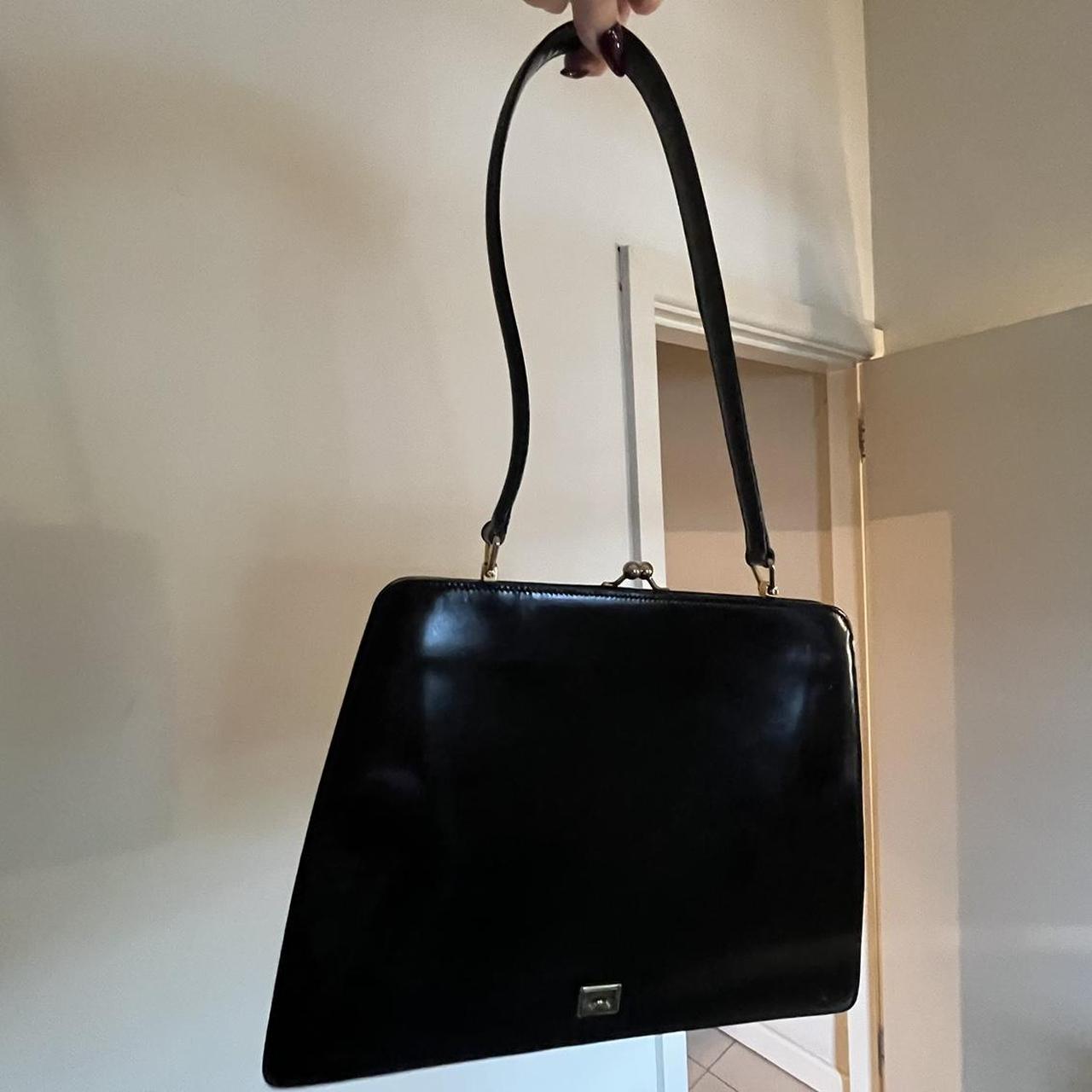 Vintage Moschino kiss lock black leather purse. This Depop