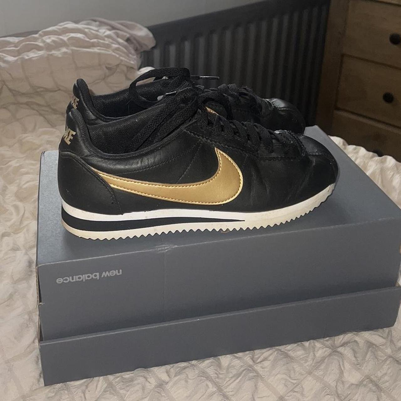 Nike Cortez black and gold size 4 worn a handful of