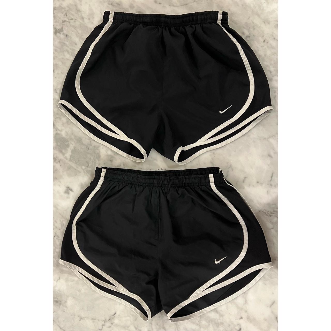 white nike shorts with black trim