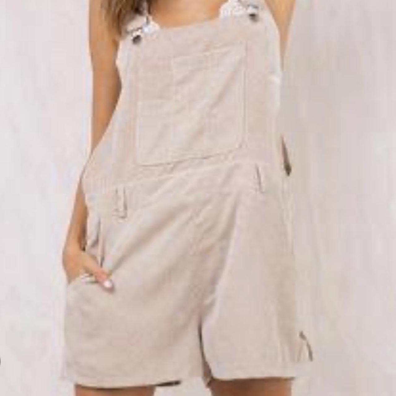 beige corduroy overalls very cute style! love them... Depop