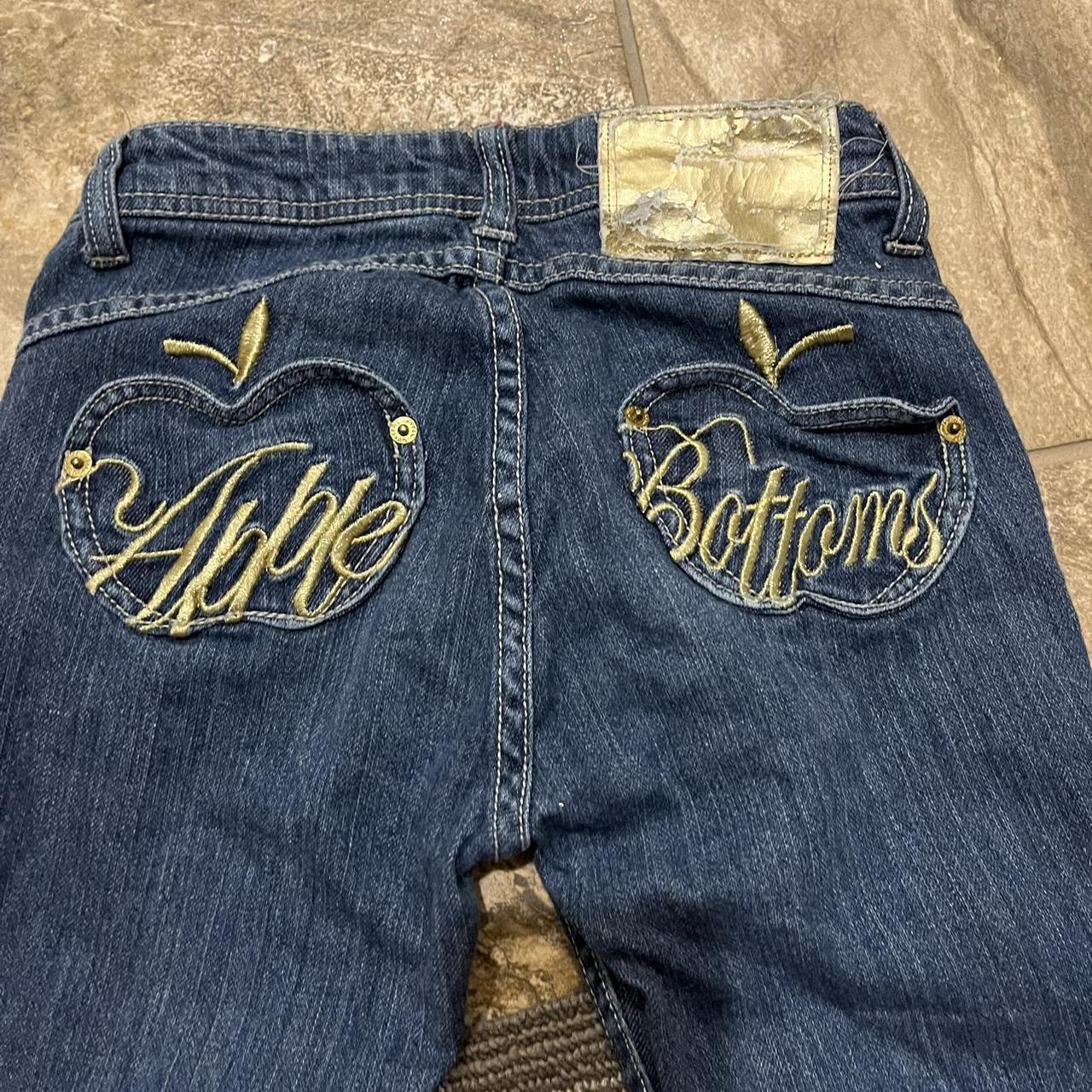 Cute blue apple jeans with embroidered back pockets... Depop