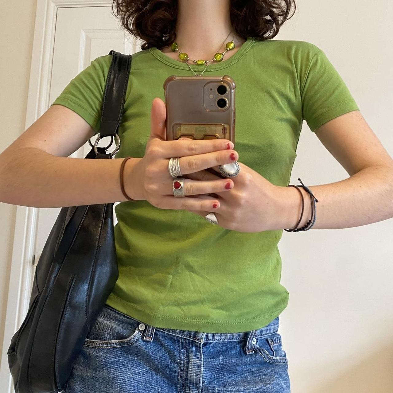 Super cool green baby tee, tight fitting top Shown... - Depop