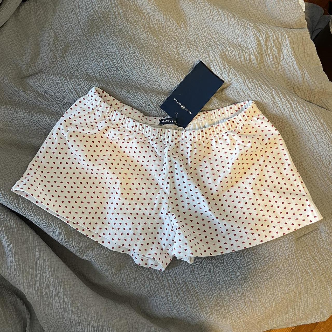 Brandy Melville white with blue heart shorts - Depop