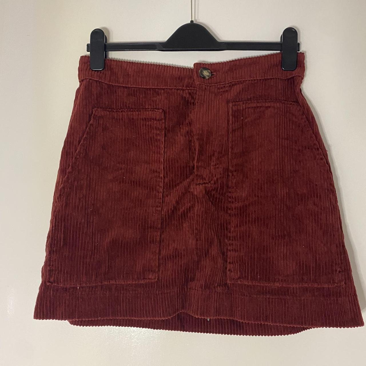 Corduroy burgundy skirt with pockets Message for... - Depop