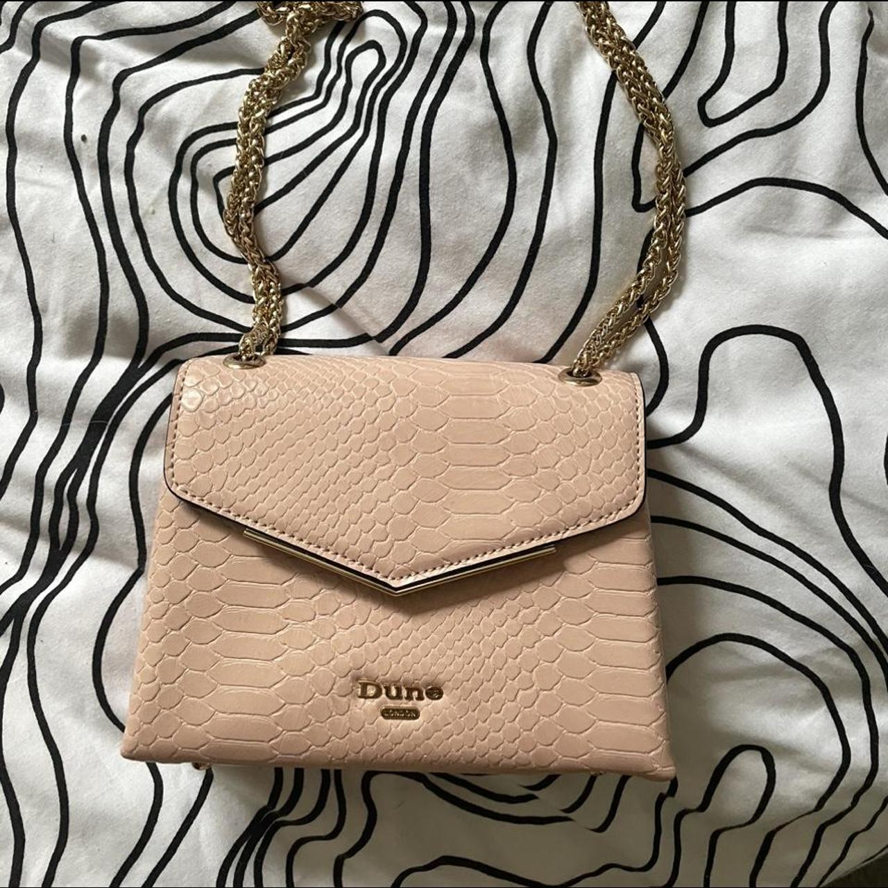 Brand new without tags mini pink dune bag. dune. Depop