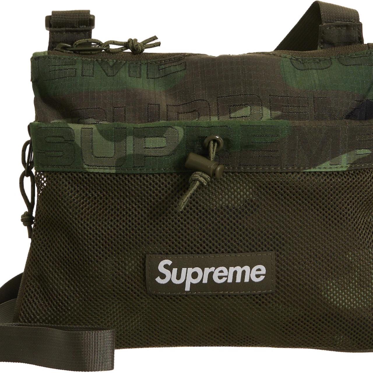 Supreme camo clearance tote backpack