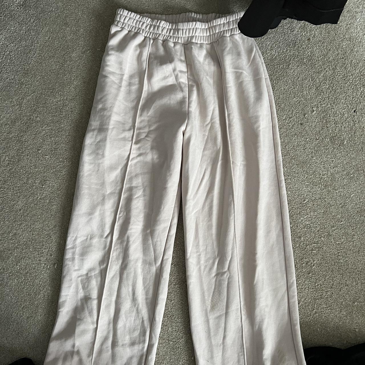 Cream Jogging bottoms, perfect for going out or... Depop