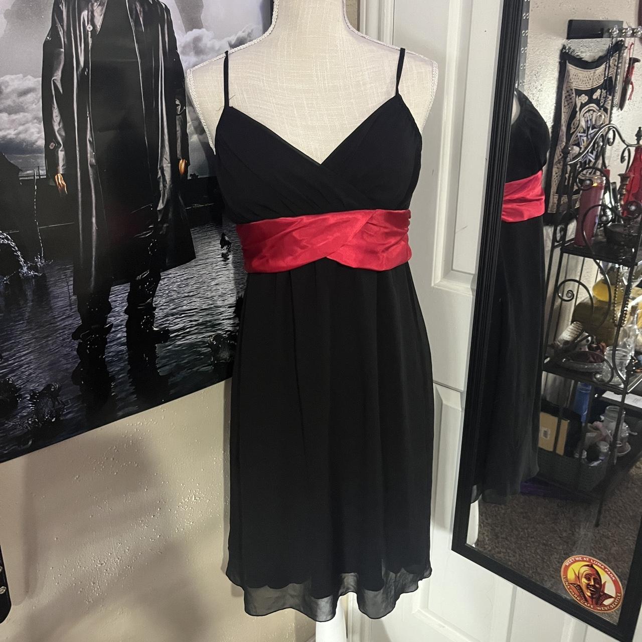 Black dress 2024 with red ribbon