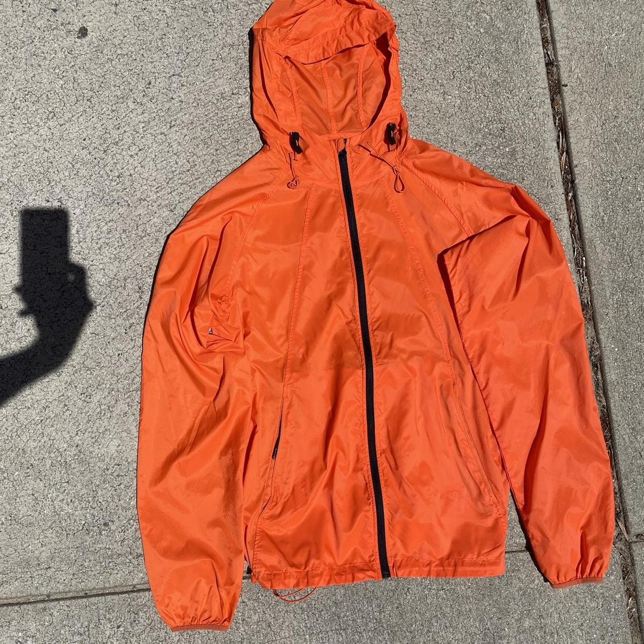 ORANGE PARCAA orange rain jacket, pretty out there... - Depop