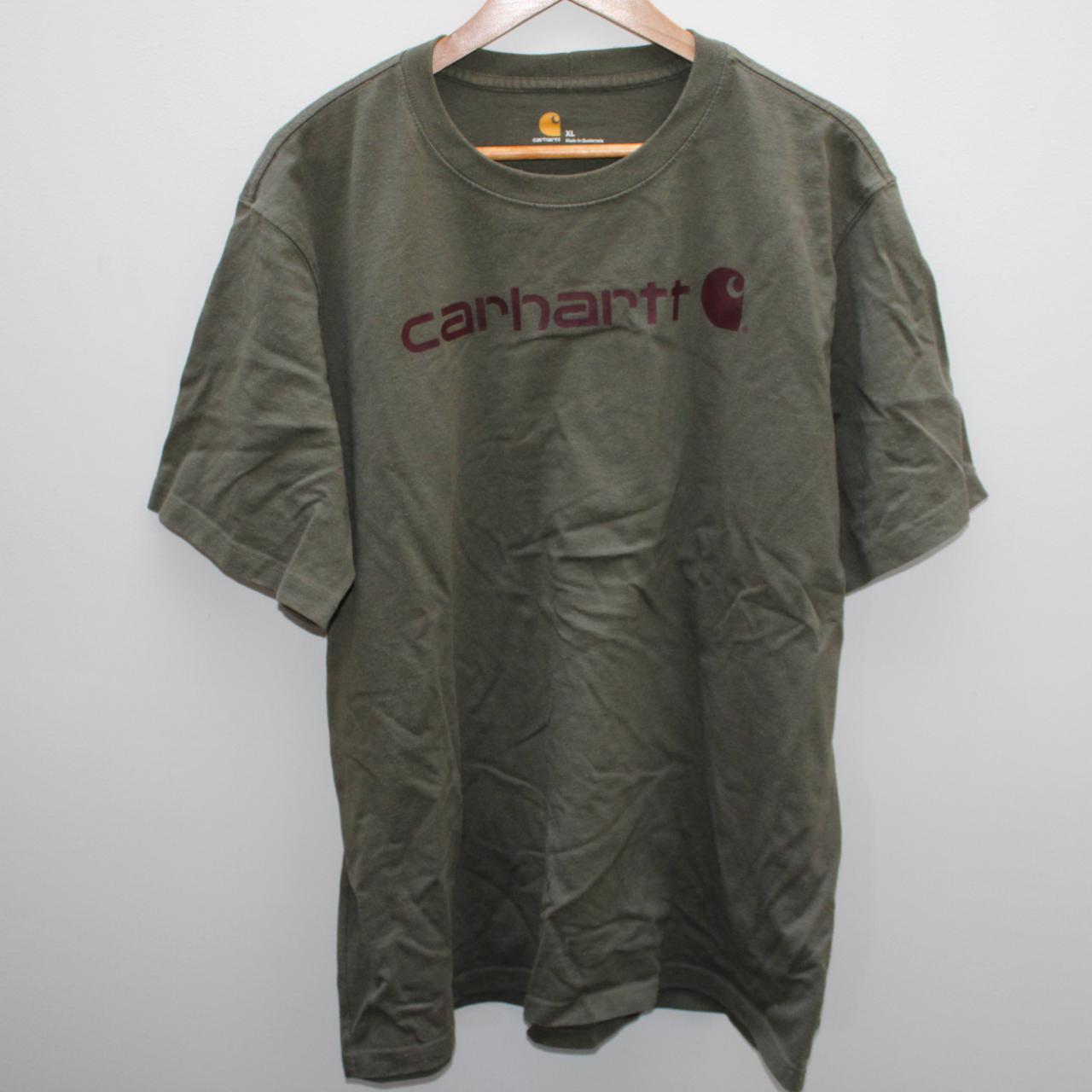 vintage carhartt dark green t shirt tagged xl, has... - Depop