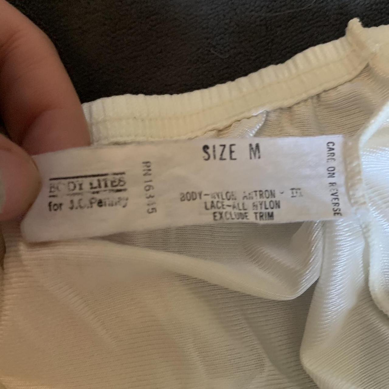 vintage jcpenney womens white slip skirt eith a slit... Depop