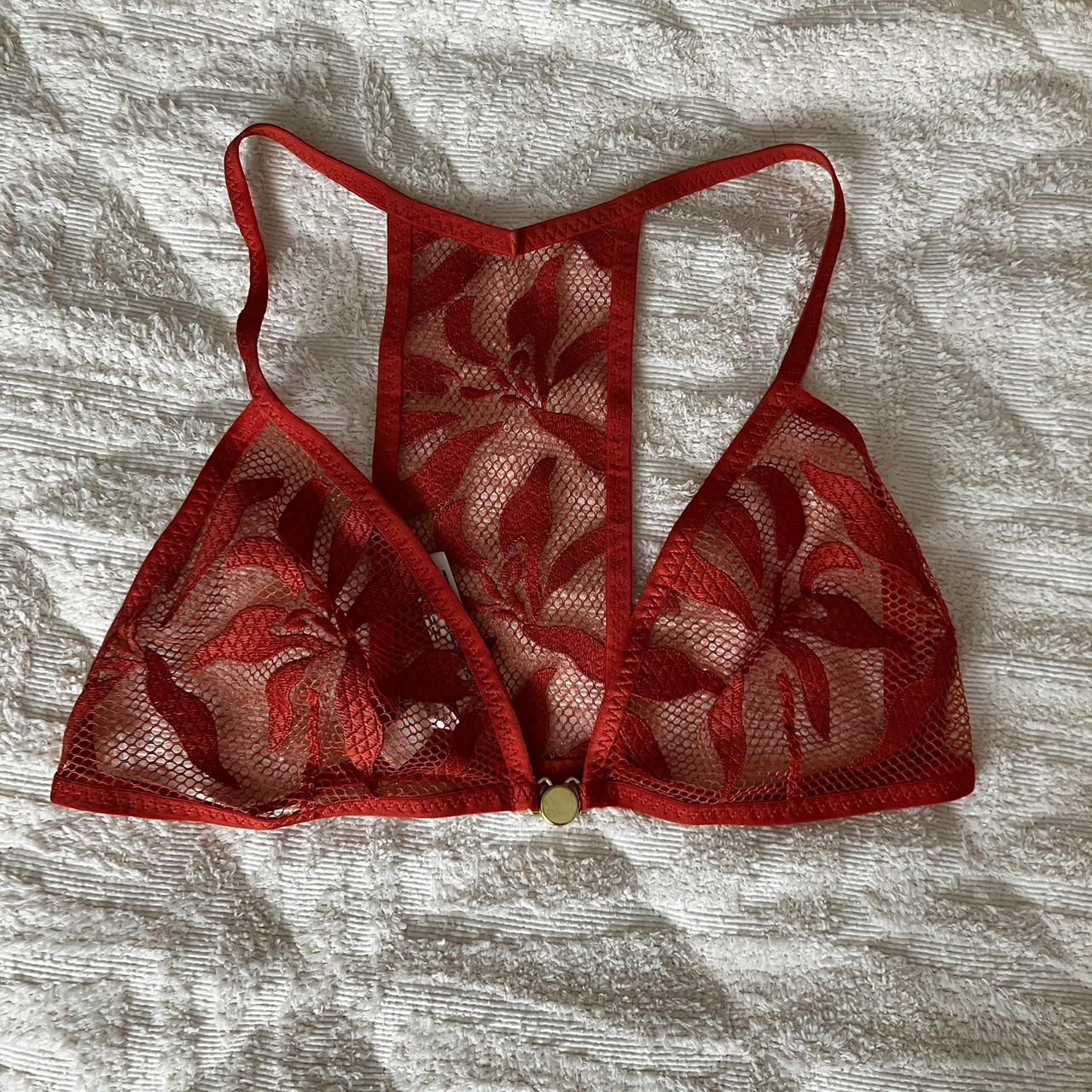 free people bralette , size medium , looks red in the