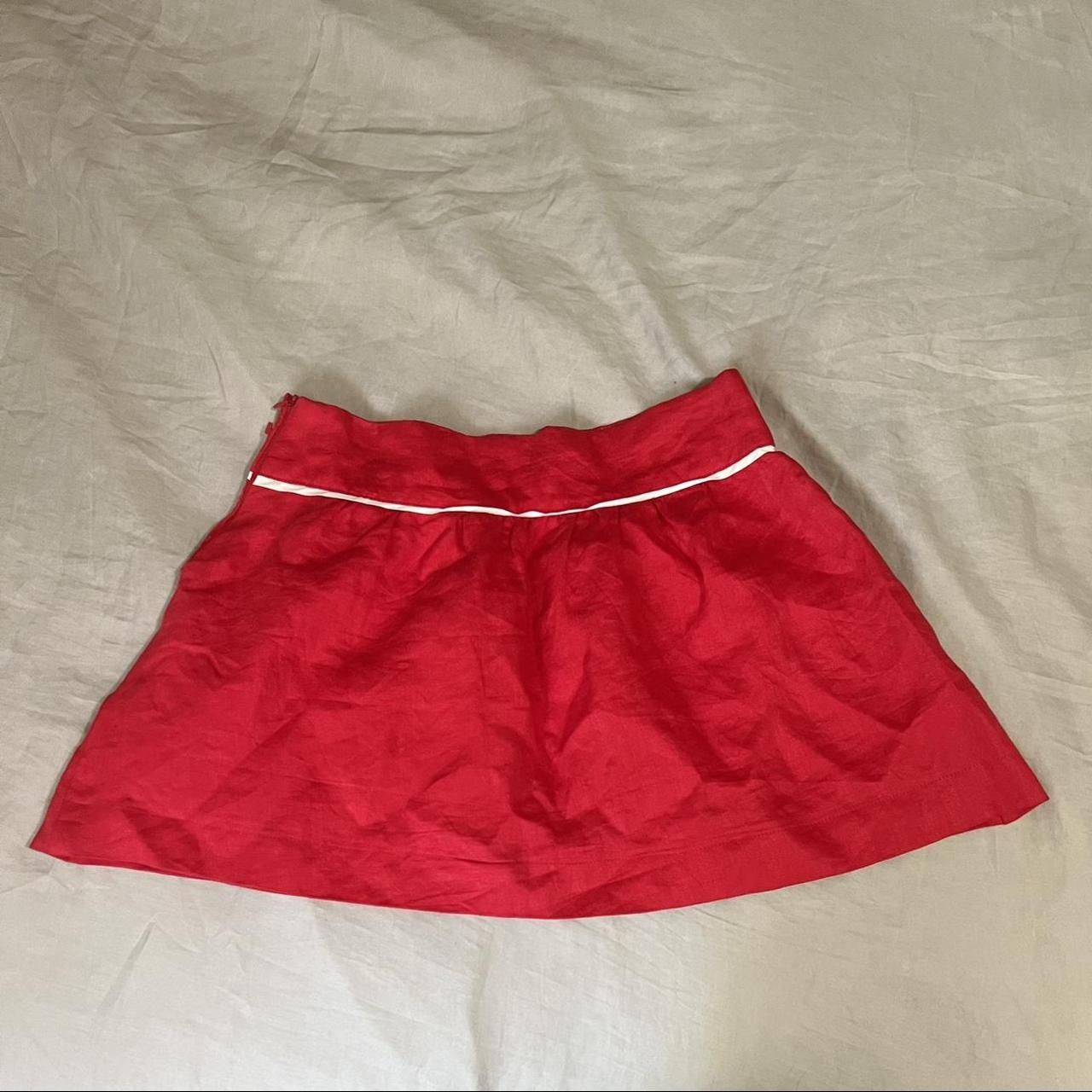 Low rise mini vintage skirt with white piping... - Depop