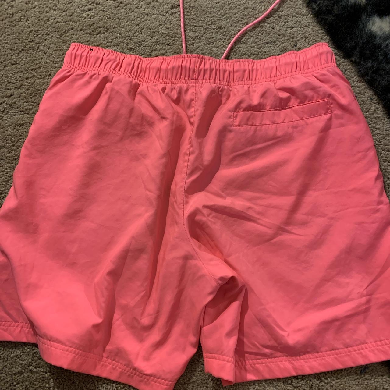 Mens bright neon pink Jordan shorts. These do have... - Depop
