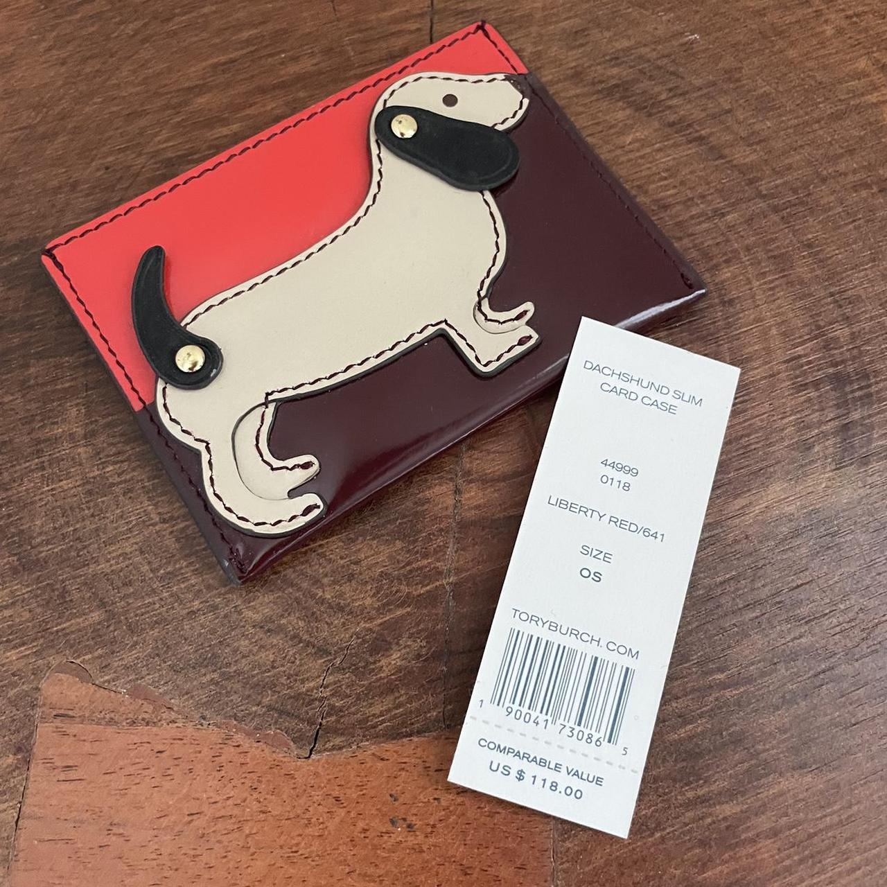 Tory purchases Burch dachshund wallet JUST THE WALLET