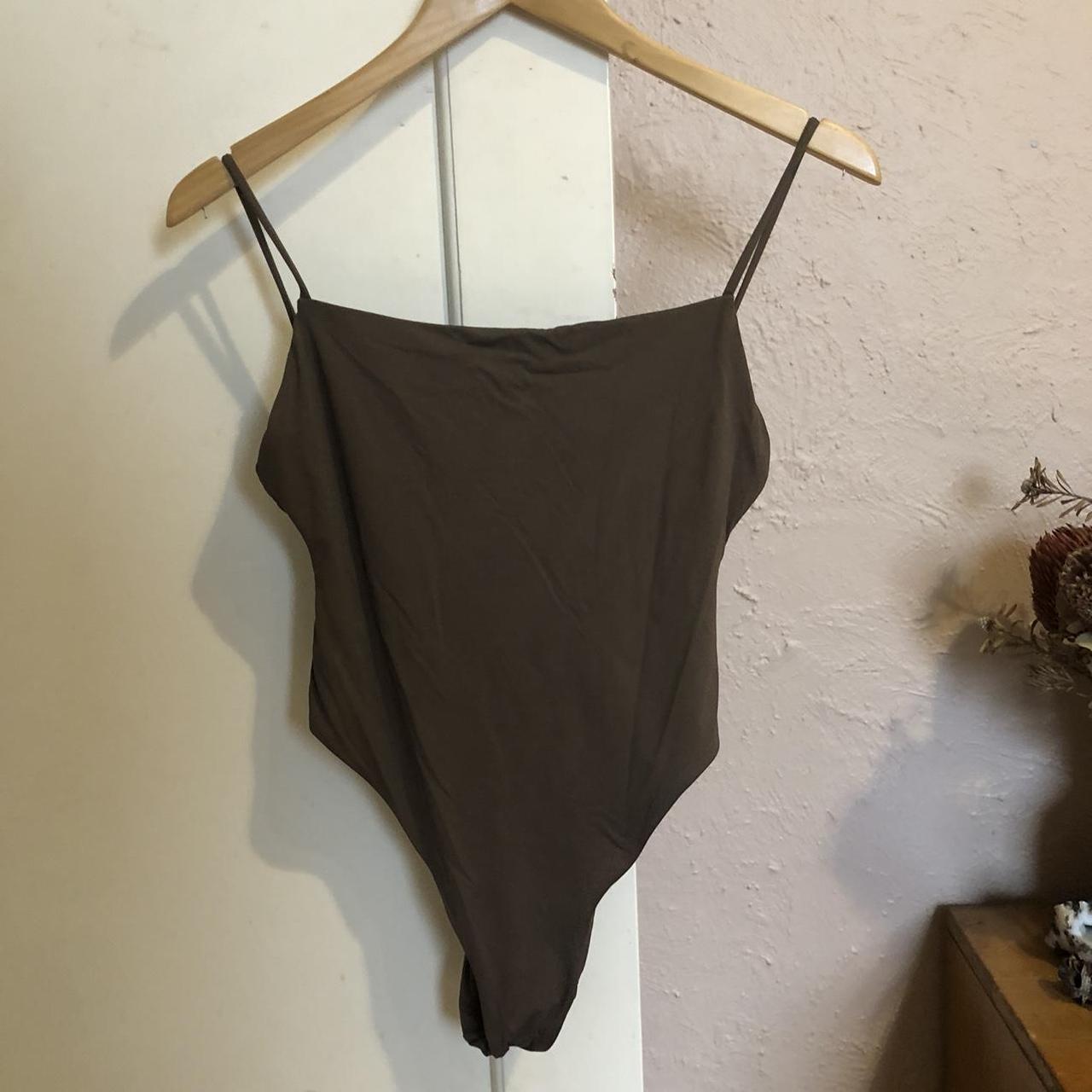 Subtitled chocolate brown one piece swim - cheeky... - Depop