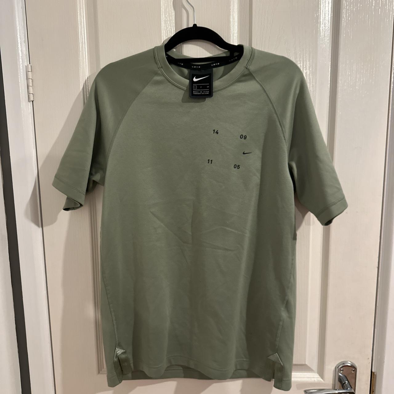 olive green nike shirt