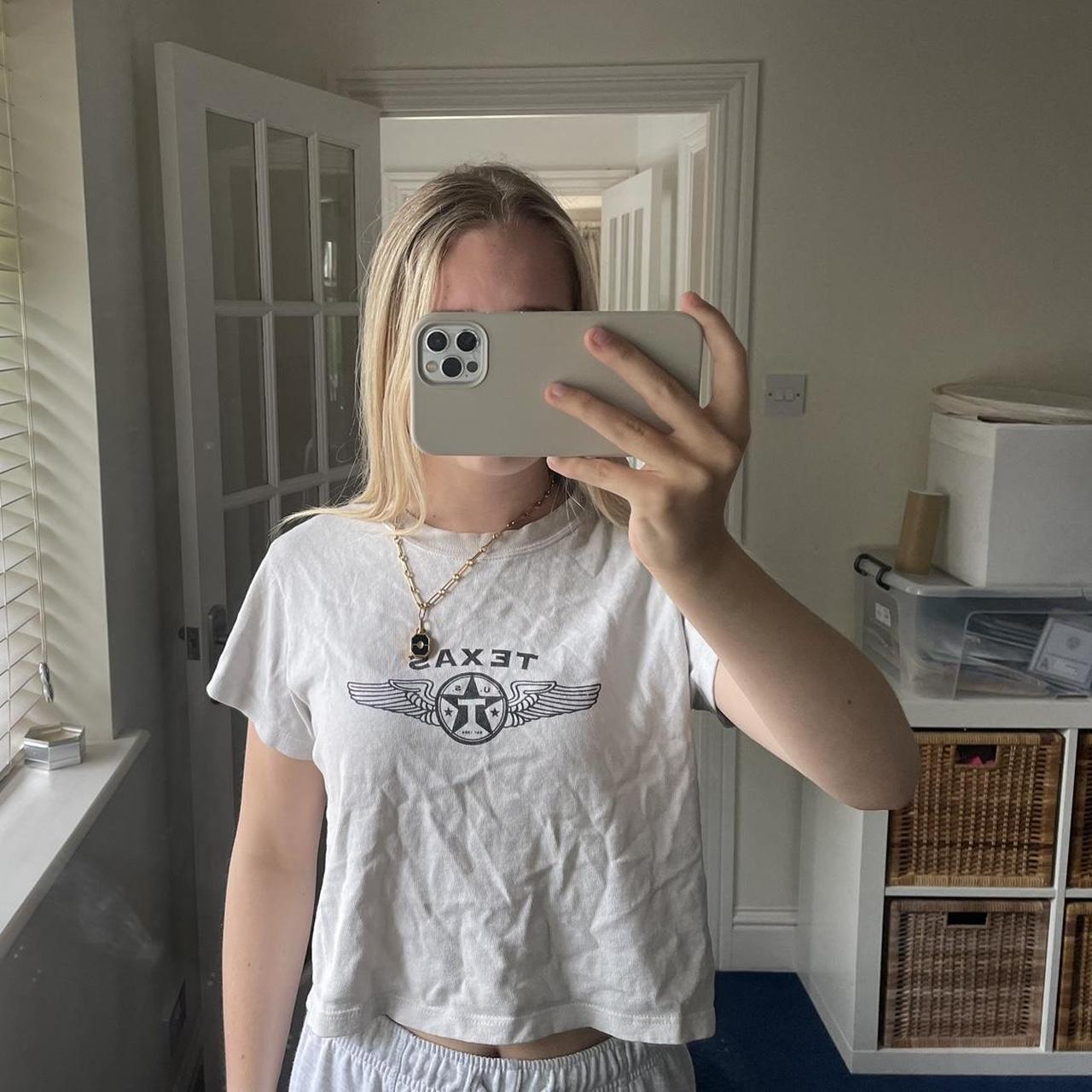 Brandy Melville beige Texas t shirt cropped t... Depop