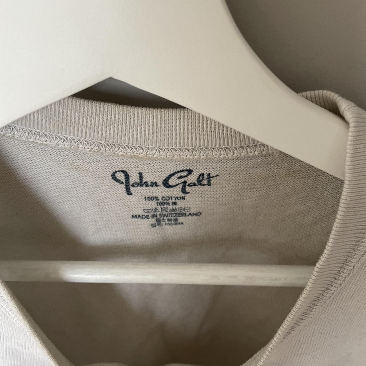 Brandy Melville beige Texas t shirt cropped t... Depop