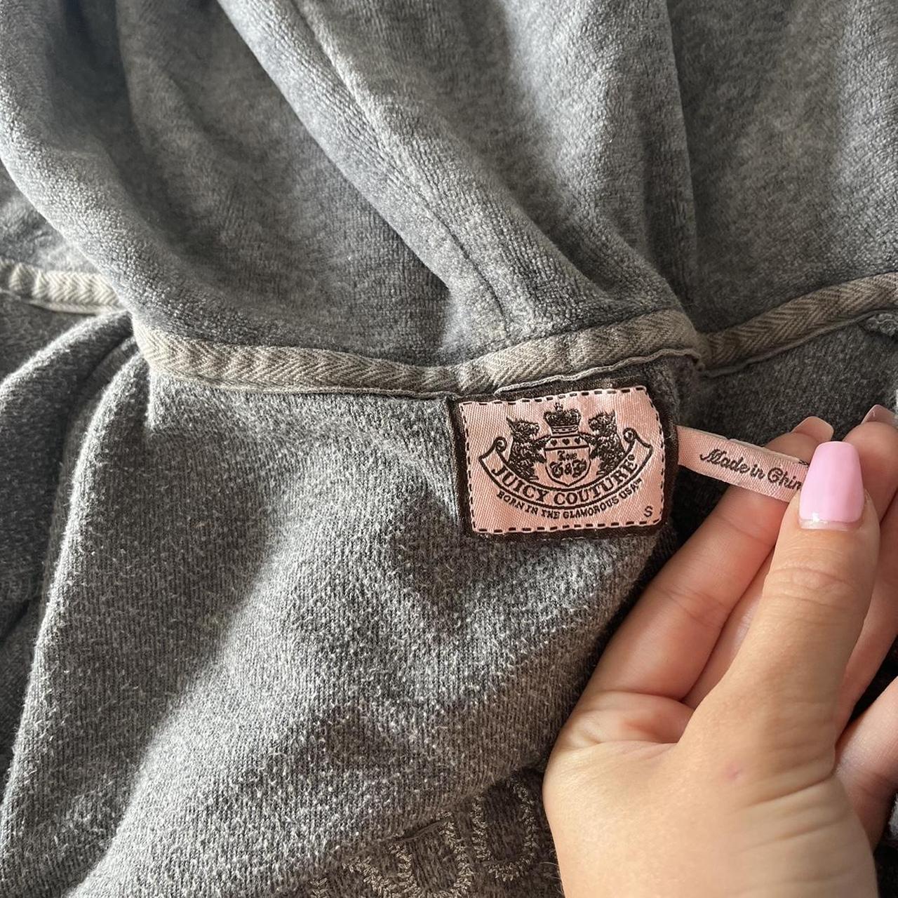 Grey juicy couture zip up. Couple jewells missing on... - Depop