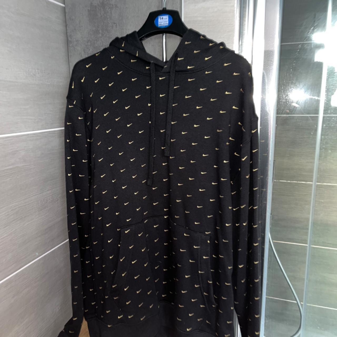 swoosh all over nike hoodie