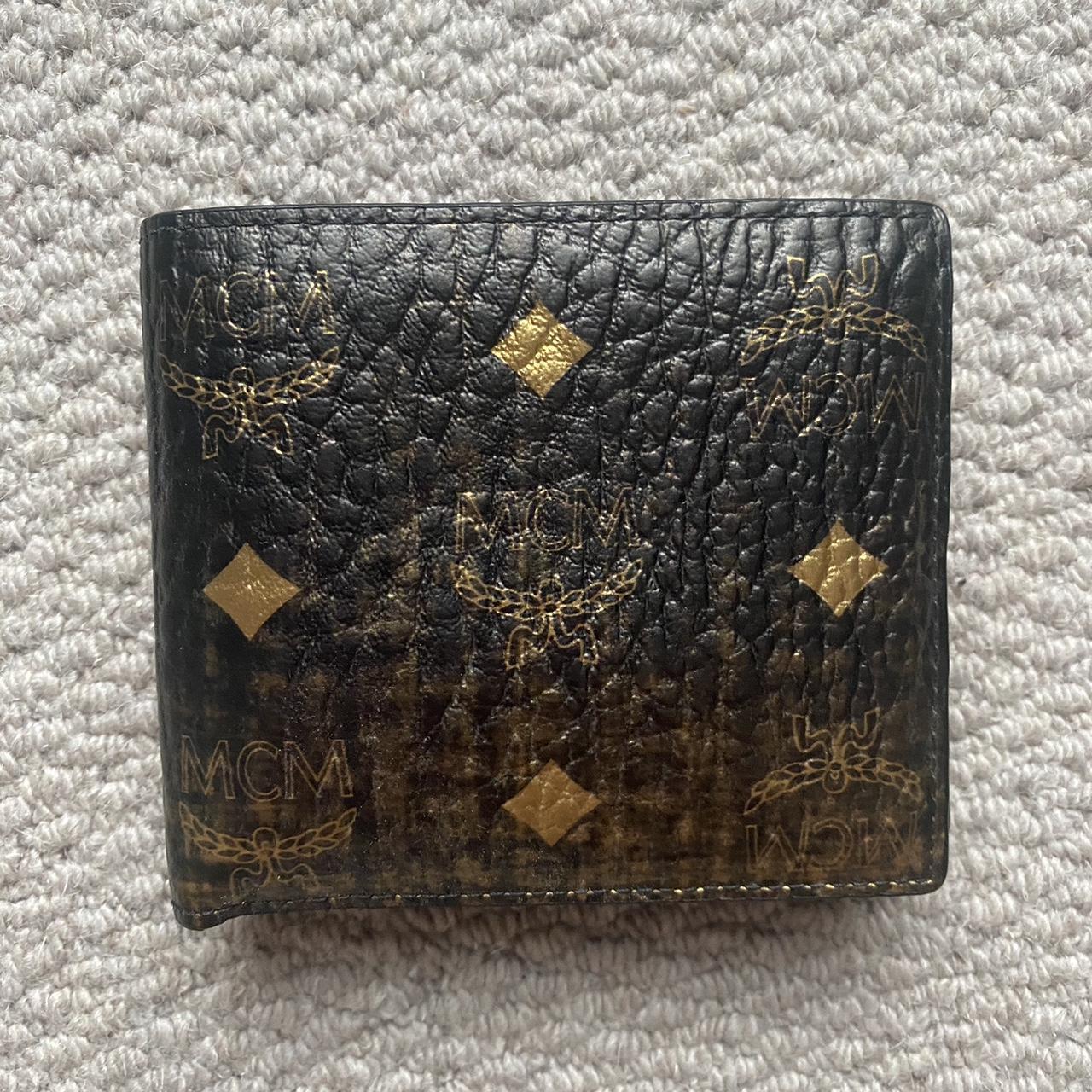 MCM limited edition black and gold wallet Bought... - Depop