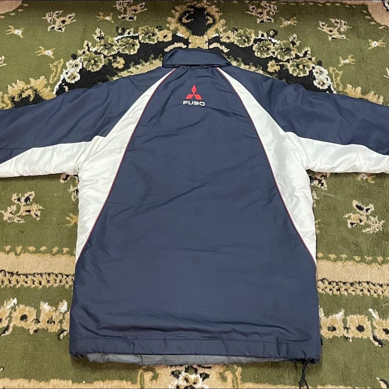 Mitsubishi Fuso jacket. Size medium. Has stains in... - Depop