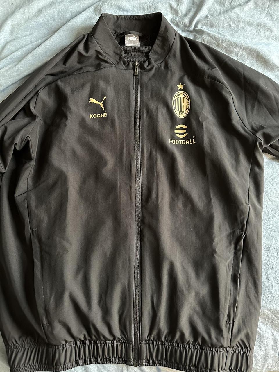 Black and gold pumas jacket hotsell