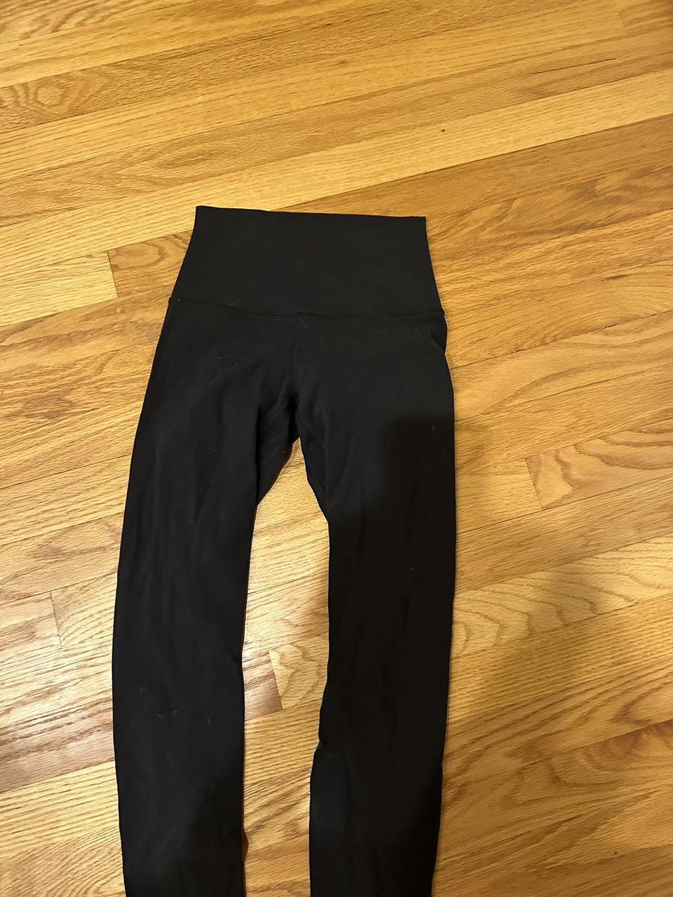 lulu size 2 black leggings small hole like shown... - Depop