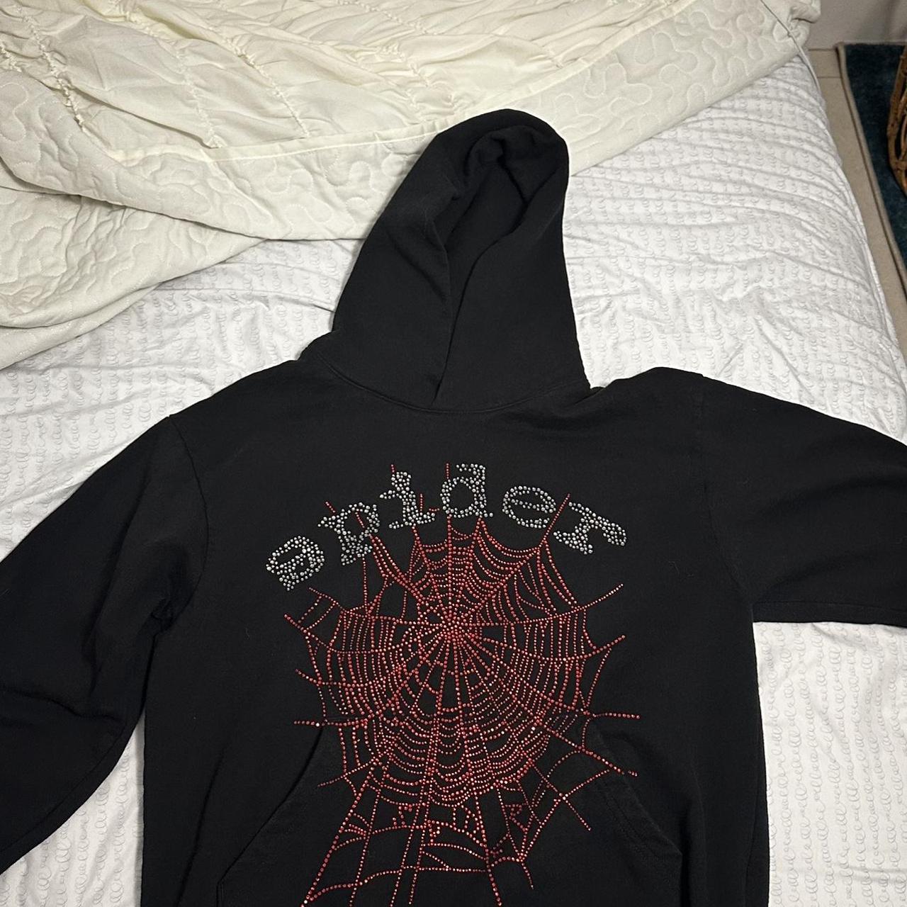 spider hoodie never worn it's too small for