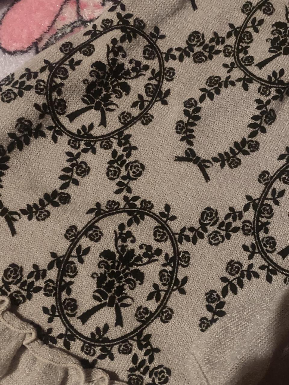 tan axes femme rose horror protagonist long sleeved... Depop