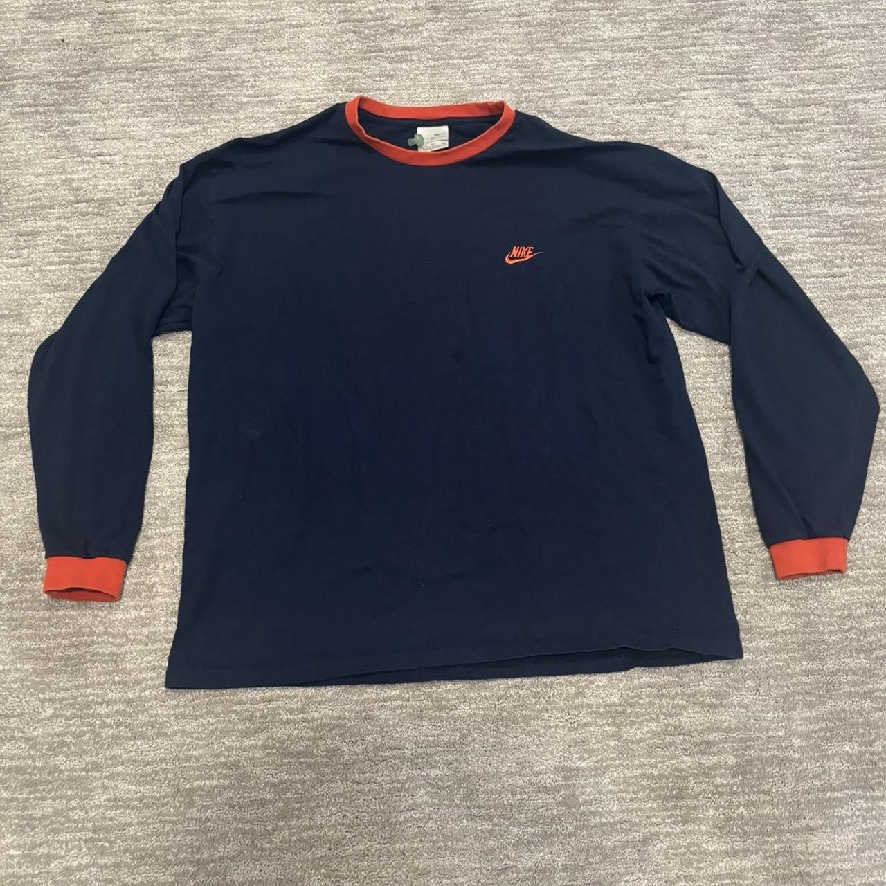 black orange and blue nike shirt