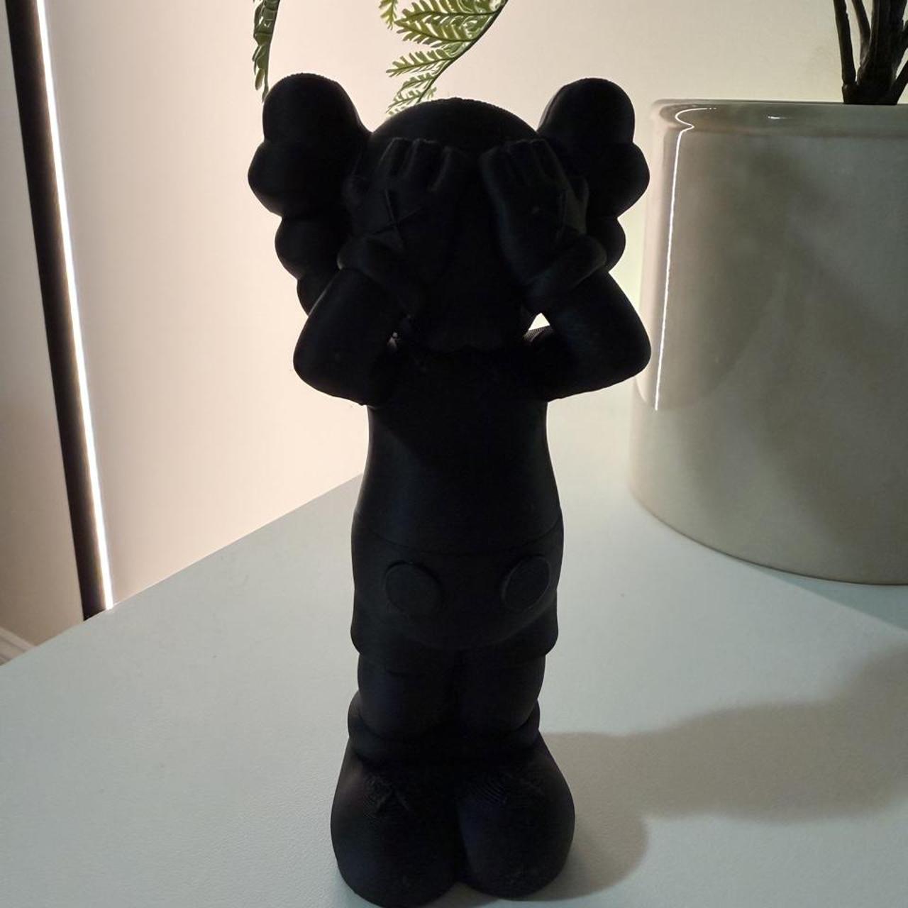 Kaws black collectibles