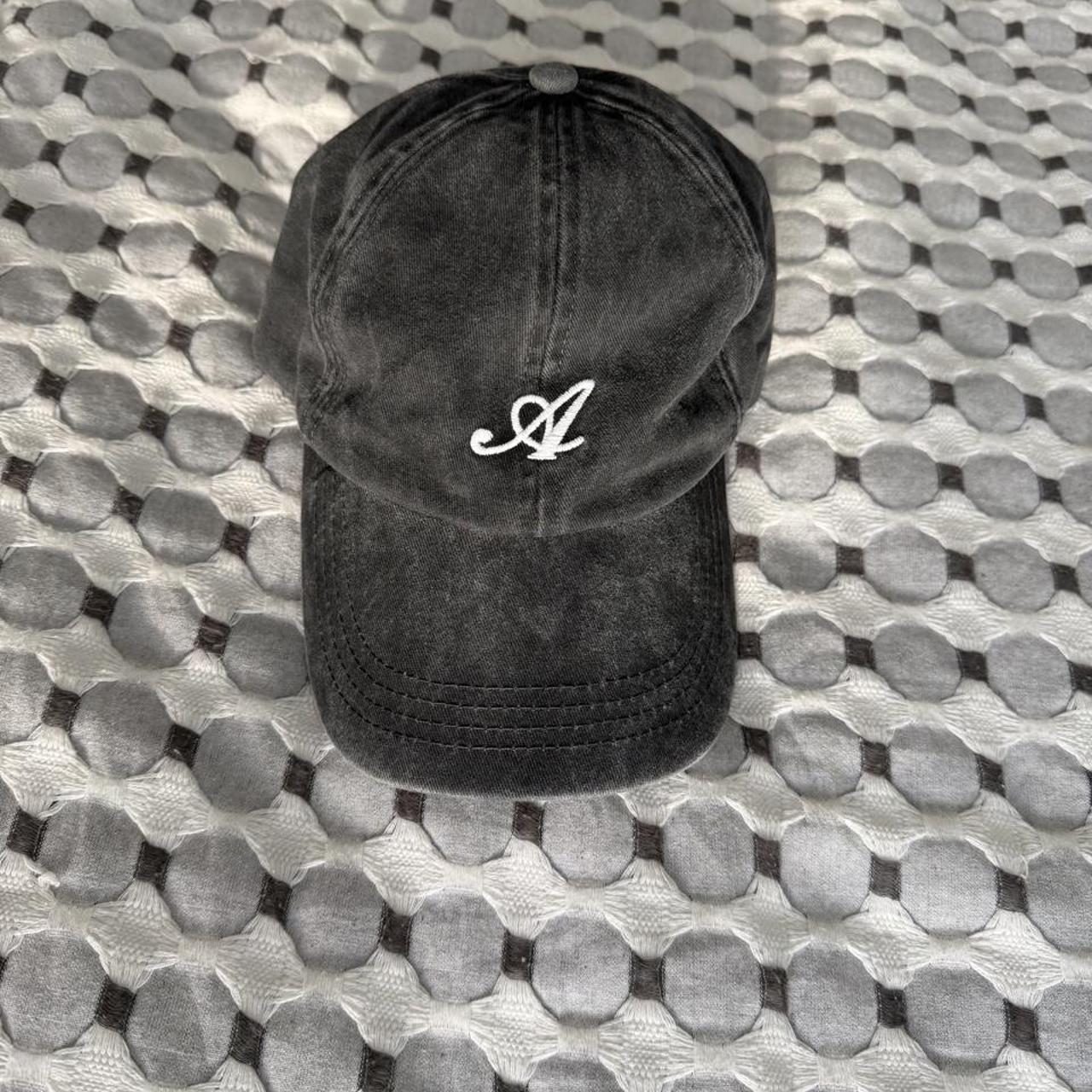 Axel arigato men's black and grey hat