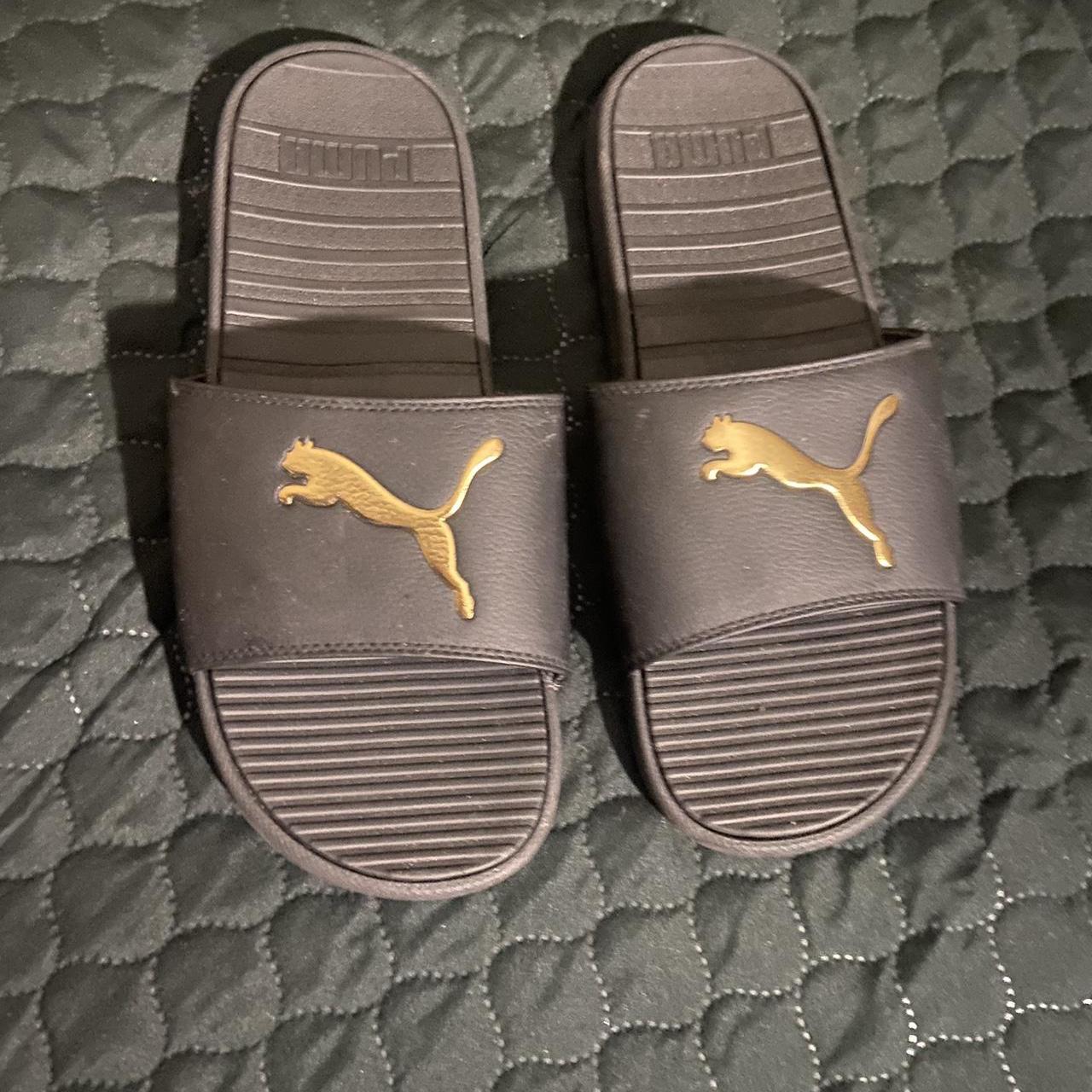 all black and gold puma slides size 11 - Depop