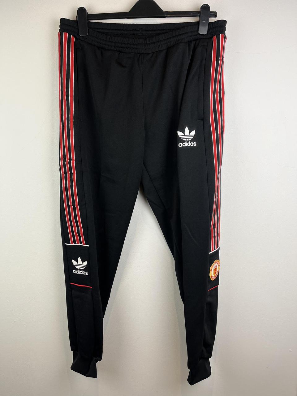 Adidas joggers hot sale black and red