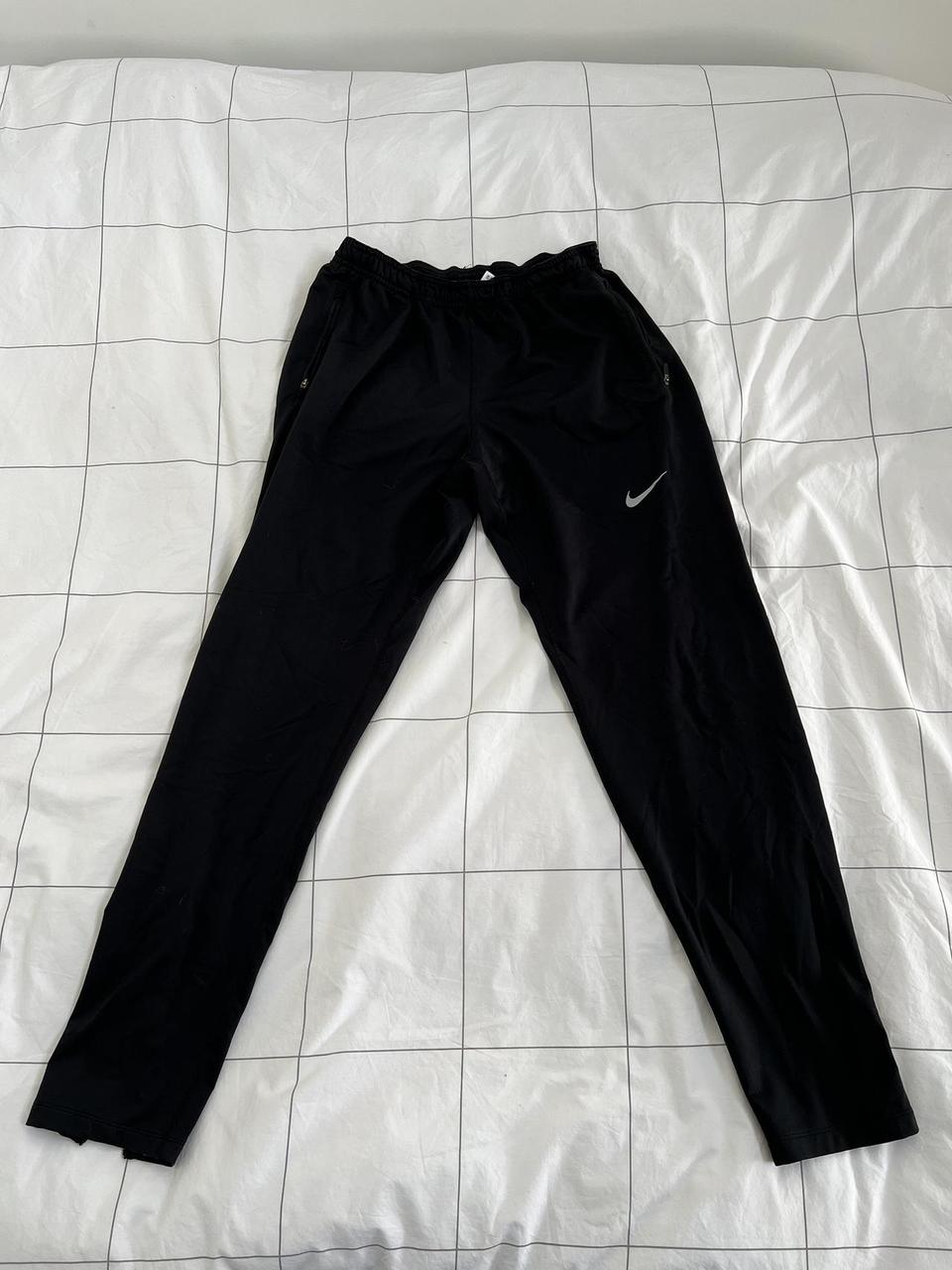 Nike Dri-Fit running pants, legs zip at the bottom.... - Depop