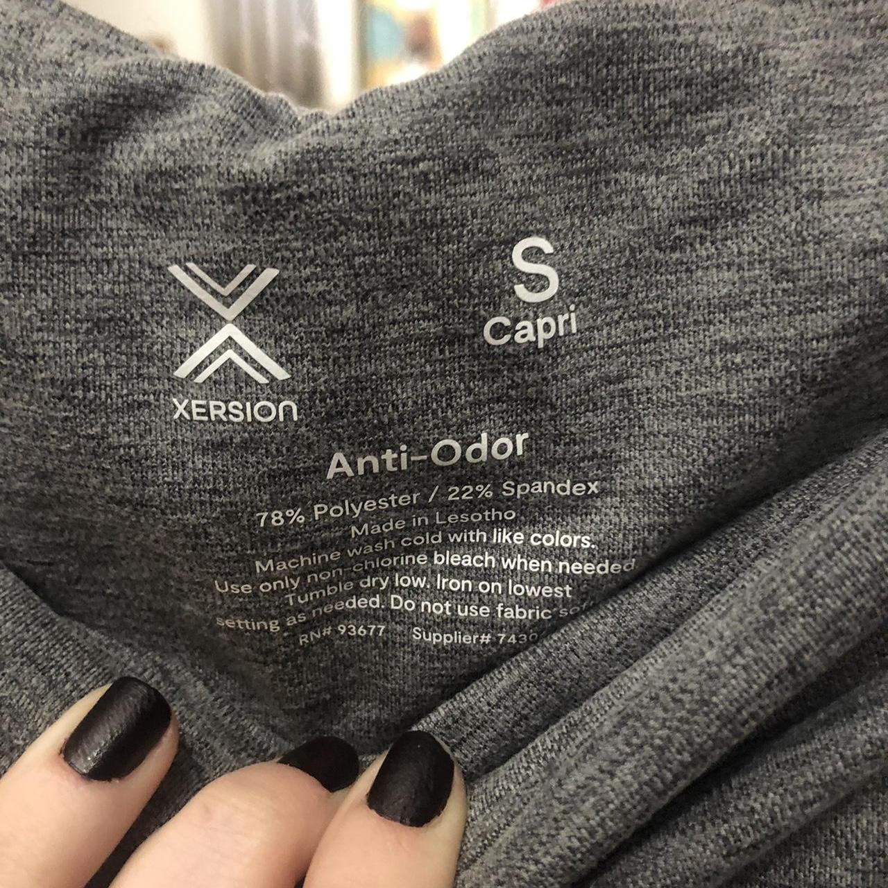 These are black Xersion leggings with silver - Depop