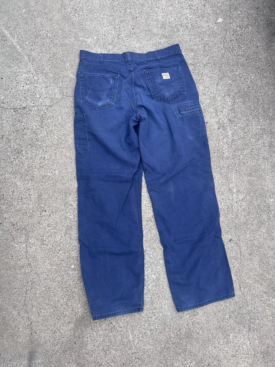 navy blue carhartt pants size 36x34. slightly faded... - Depop