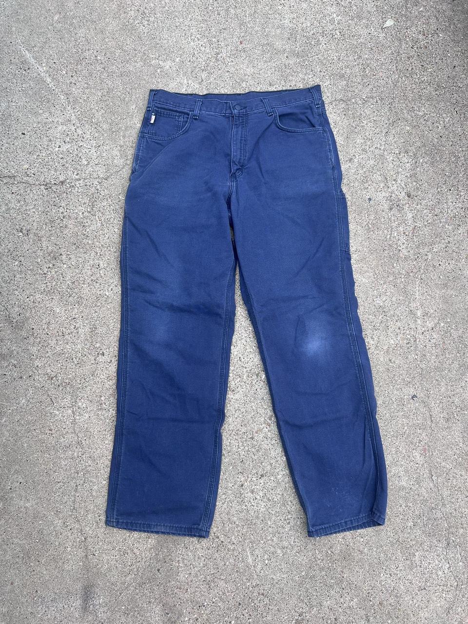 navy blue carhartt pants size 36x34. slightly faded... - Depop