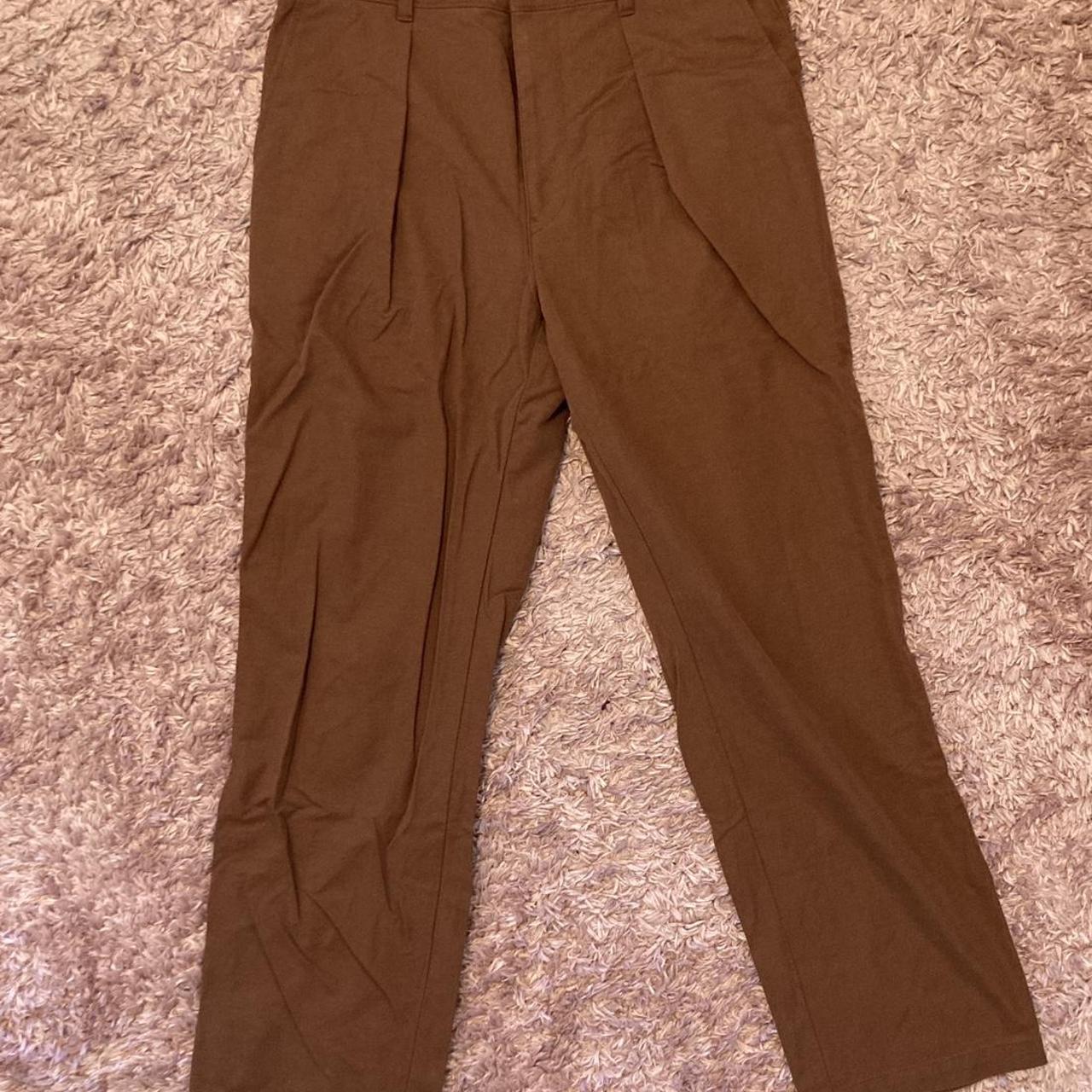 Woman’s Uniqlo Brown pleated wide legged