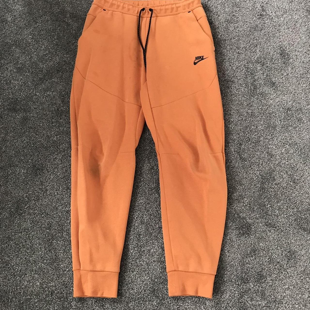 orange nike sweatpants mens