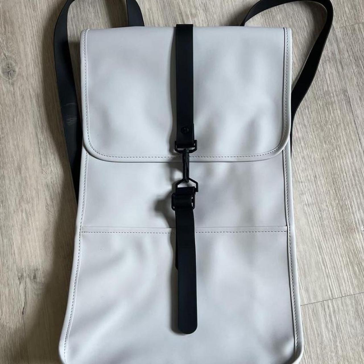 NWOT WHITE AND BLACK RAINS BACKPACK Capacity Depop