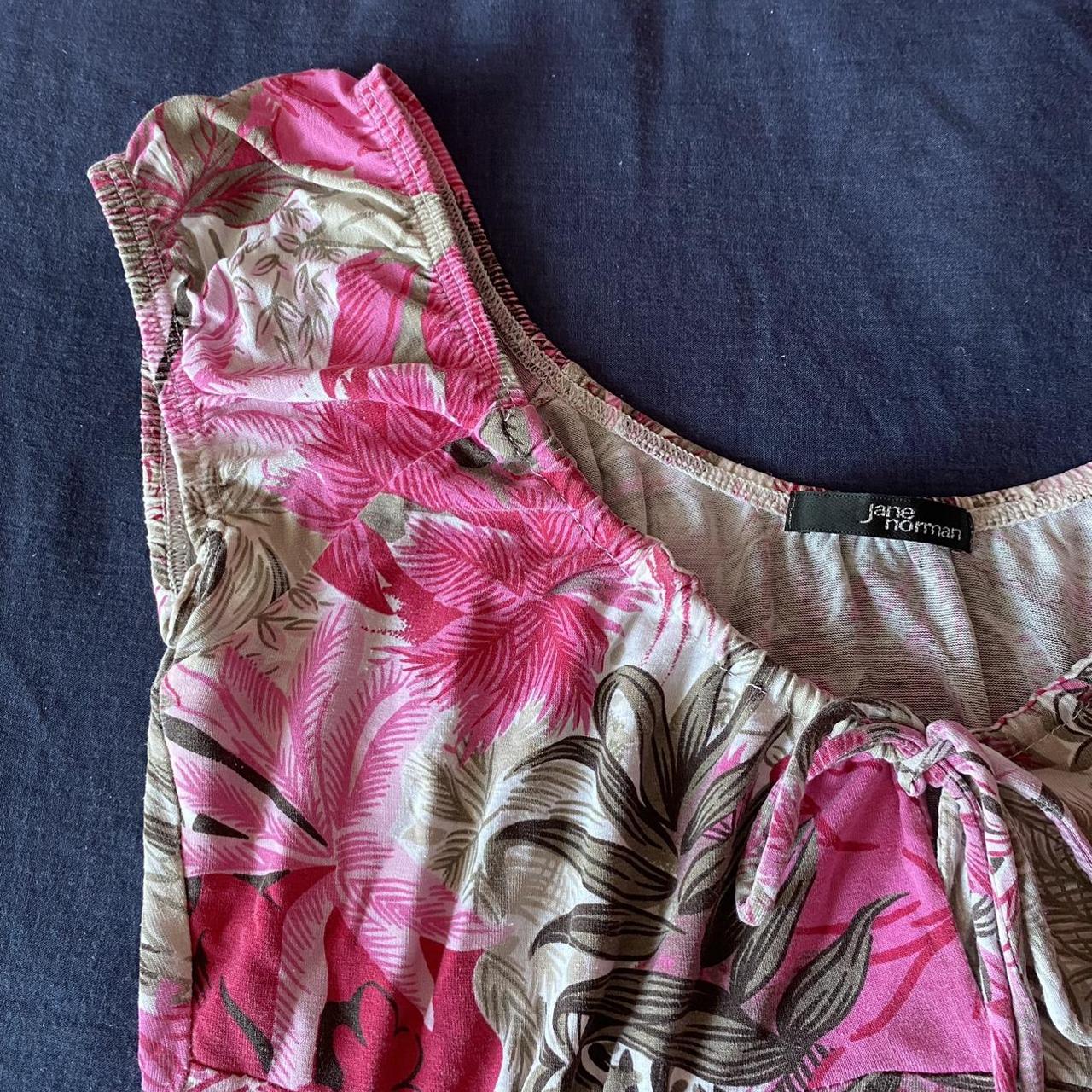 Super cute milkmaid top!! Has a raw hem as it