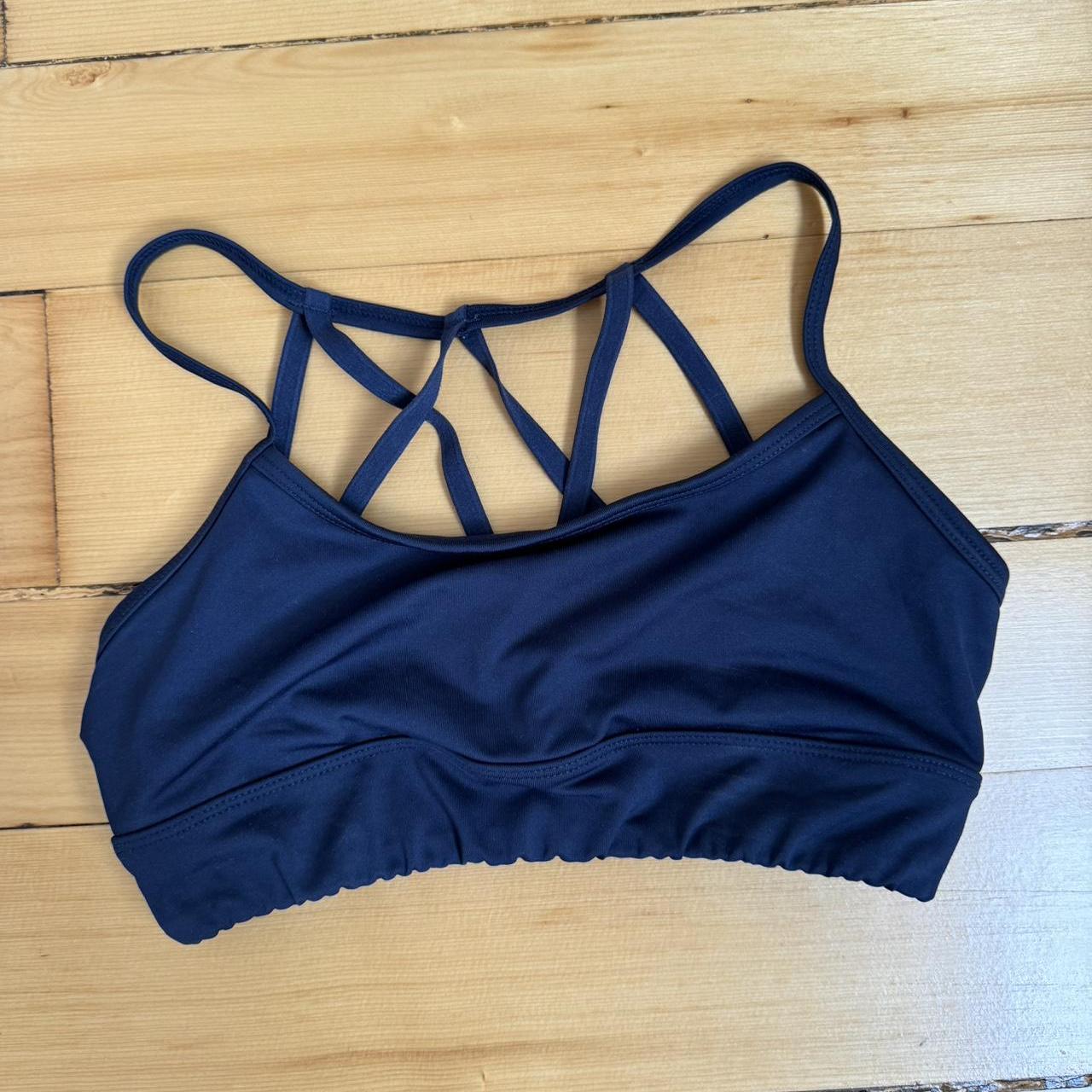 Navy blue sports bra. Reminds me a lot of alo. I... - Depop