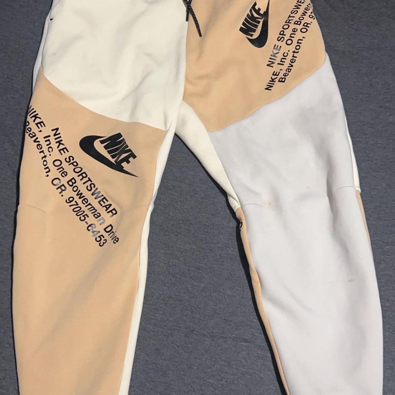 nike tech cream joggers