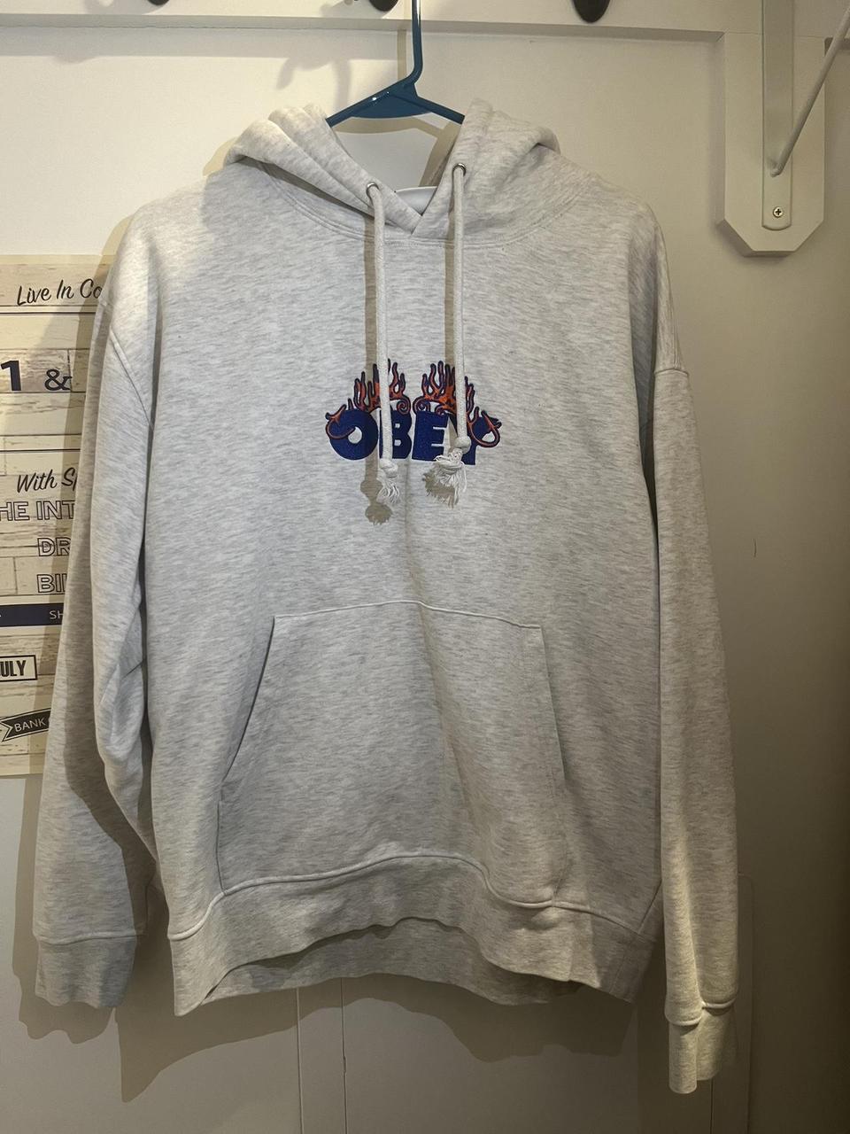 Heather grey obey hoodie size small kinda fits like