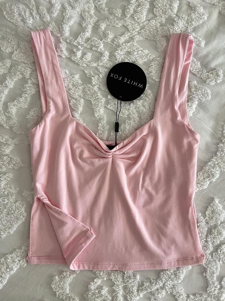 White fox Taking Off Top in the color baby pink - Depop