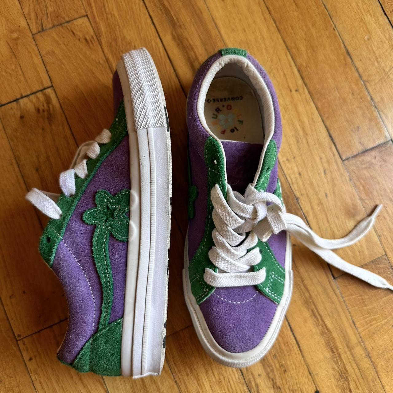 converse purple and green golf le fleur shoes in a