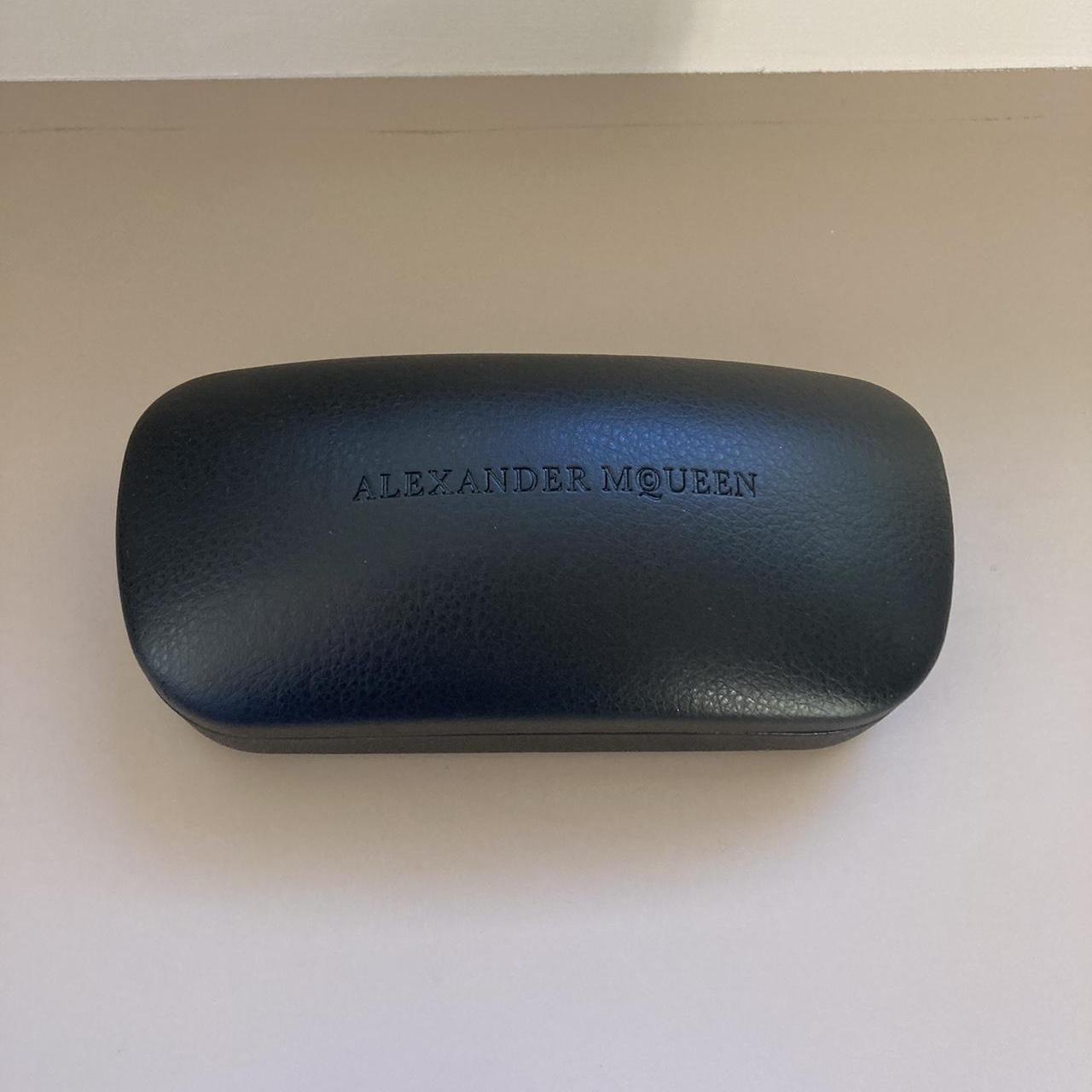 Alexander McQueen Sunglasses Case Open to counter